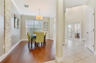 Off of the entry is a separate formal dining space