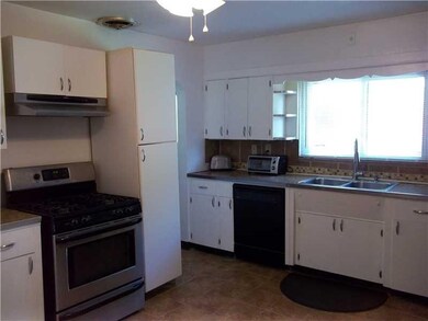 Kitchen. Covered back porch directly off Kitchen.