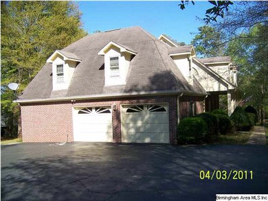 Two-car attached garage.  Bonus room on top of gar