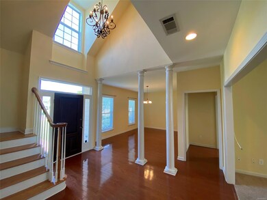 Grand entrance with beautiful hardwood flooring we