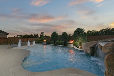 Almost no editing in this photo - this is what a true summer sunset looks like here!  Dip in to the 7 foot deep pool or take a jump from the grotto waterfalls!