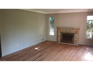 Living Room features gas fireplace & Hardwood Floo