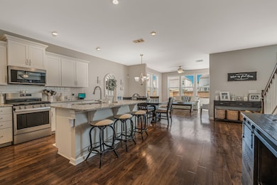 This open layout includes a morning room, adding to the square footage and versatility.