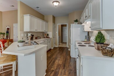Open To Great Room And Dining Area With Lots Of St