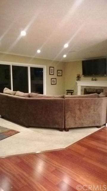 Large family room with a fireplace, great for Movi
