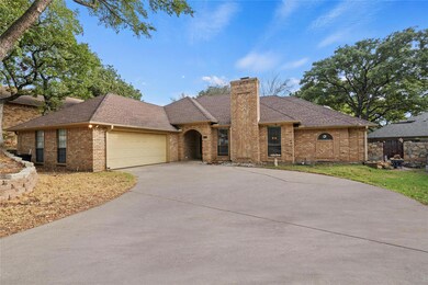 Ranch-style house featuring a garage
