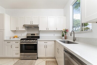 New range, range hood, dishwasher and disposal.