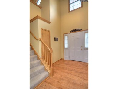 The bright and spacious two story foyer is a great