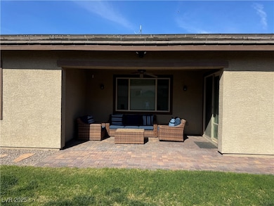 View of patio with an outdoor living space and a c