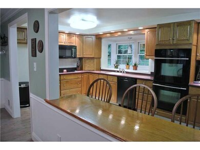Kitchen. Large Opening from Dining Room Looking in