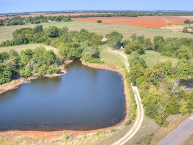 View of property location featuring a large body of water and rural landscape