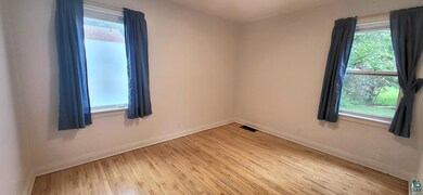 Spare room with light hardwood / wood-style floors