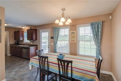 Large dining room with plenty of windows for natural light.