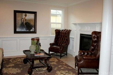 FORMAL LIVING ROOM WITH FIREPLACE