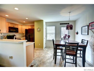 Living room open to the kitchen/dining area