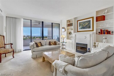 Living room featuring light carpet and built in fe