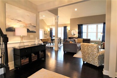 Striking dark bamboo floors and soaring ceilings h