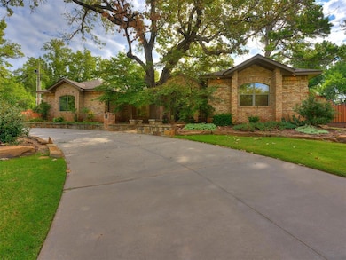 View of front of property with brick siding and dr
