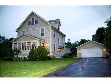 Exterior Front. Two car detached garage with doubl