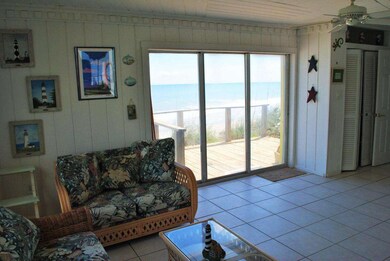 Another living room w/ all tile