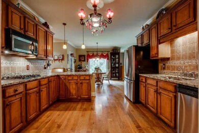Your new Kitchen has wood cabinets with decorative