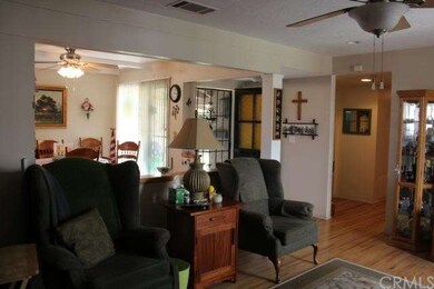 Open Living Room with view of Dinning Area and Hal