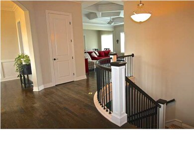 Sophisticated foyer entry with elegant staircase, 