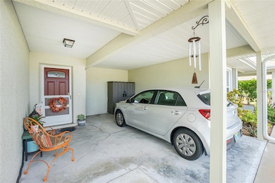 Private carport at entry