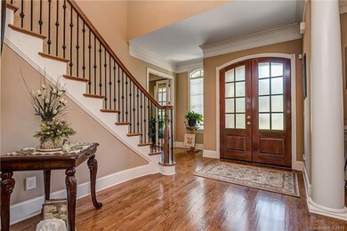 Dramatic 2-Story Foyer with Hardwood Floors, Arche