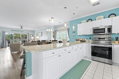 Kitchen with crown molding, a kitchen breakfast ba