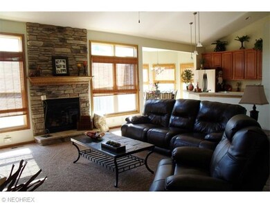 Great room with fireplace and vaulted ceiling