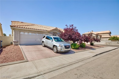 View of front of property featuring concrete drive
