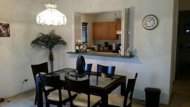 Dining Room Area w/Pass Through Counter to Kitchen