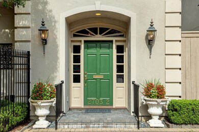  A beautiful front door with adjoining patio welco