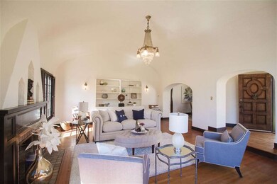 Tall ceilings, unique chandeliers, custom sconces.