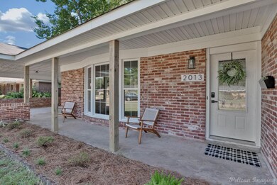 View of patio with a porch
