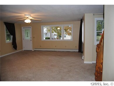 Living Room Covered rocking chair porch opens into