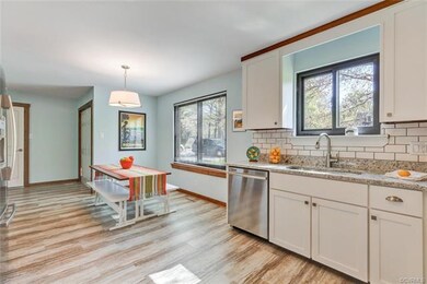 Entertain or just enjoy from this kitchen. New lig