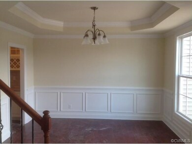 Dining room (with tray ceiling) is attached to the