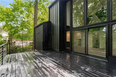 Main level deck offers ample space for a grill, di