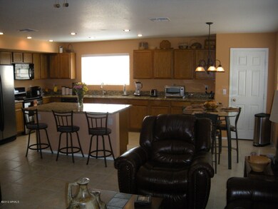 KITCHEN OPEN TO FAMILY ROOM