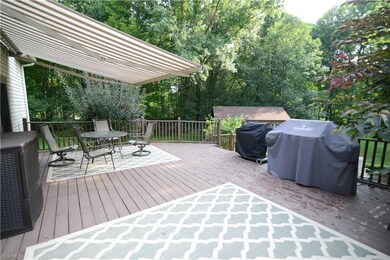 Deck on back of home with retractable awning