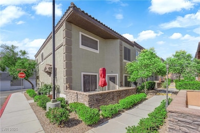 View of side of property with stucco siding and a