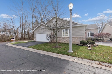 1409 Weatherhill Ct unit 9, East Lansing, MI 48823 - photo 2