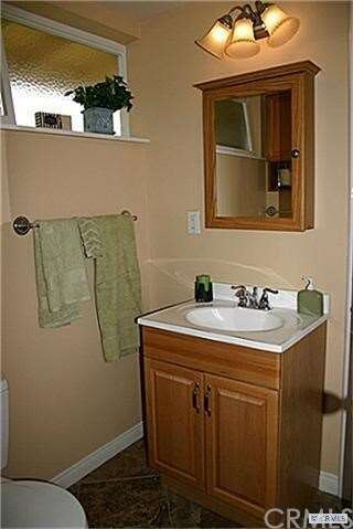Master vanity and stall shower