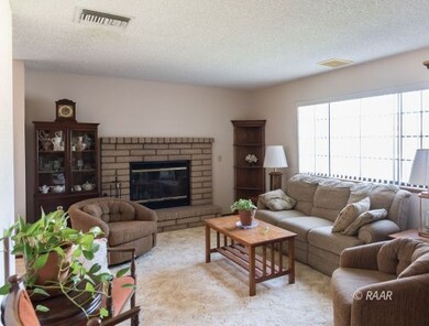 Living room with fireplace...