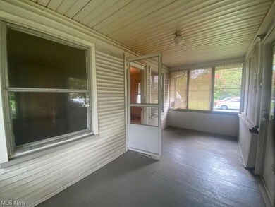 Enclosed front porch