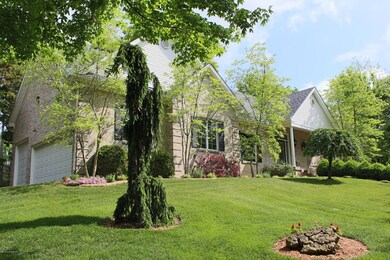 Front left of home with 3 car garage