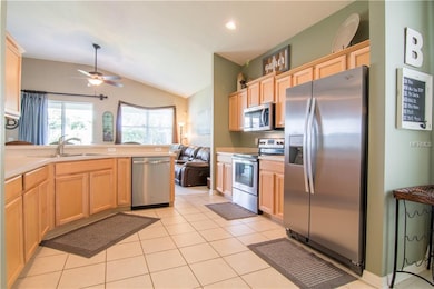Large kitchen with Wood Cabinets and Stainless App