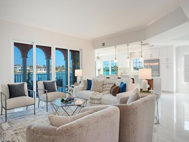 Living room featuring crown molding and a water vi